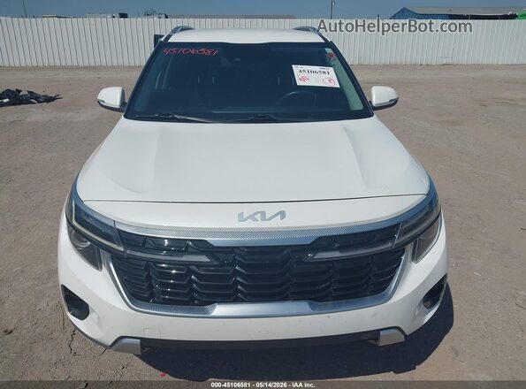 KNDER2AA0R7490474 2024 KIA SELTOS White ხელსაწყოთა პანელის ხედი