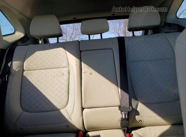 KNDERCAA2P7404035 2023 KIA SELTOS Gray Vista de los asientos traseros