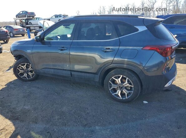 KNDERCAA2P7404035 2023 KIA SELTOS Gray Trasero izquierdo
