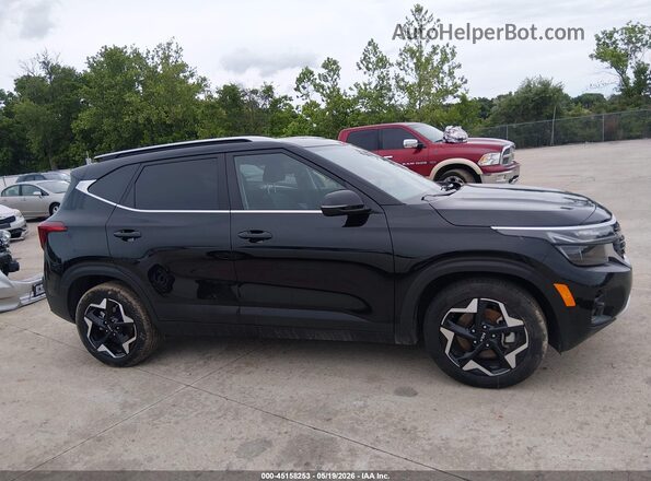 KNDERCAA8R7506765 2024 KIA SELTOS Black Vista interior trasera