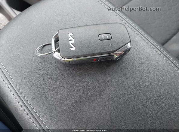 KNDEUCAA7S7681593 2025 KIA SELTOS Синий Вид панели приборов