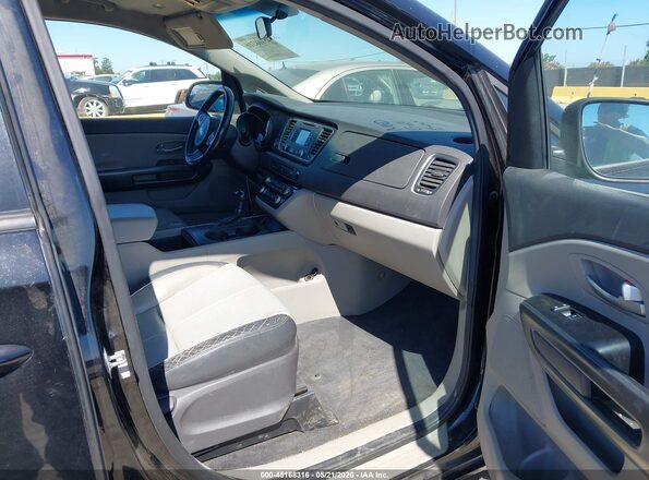 KNDMB5C12G6209213 2016 KIA SEDONA Черный Вид салона спереди