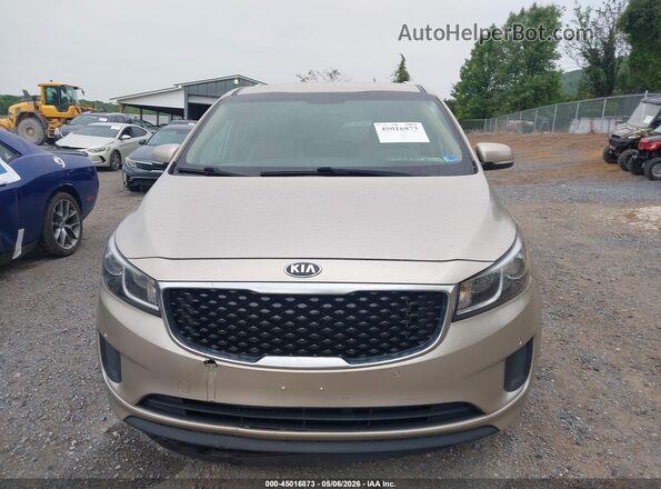 KNDMB5C12H6266867 2017 KIA SEDONA Золотой Вид задней части салона
