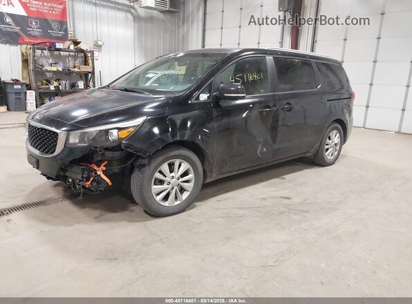 KNDMB5C13H6337896 2017 KIA SEDONA Black Przód lewy