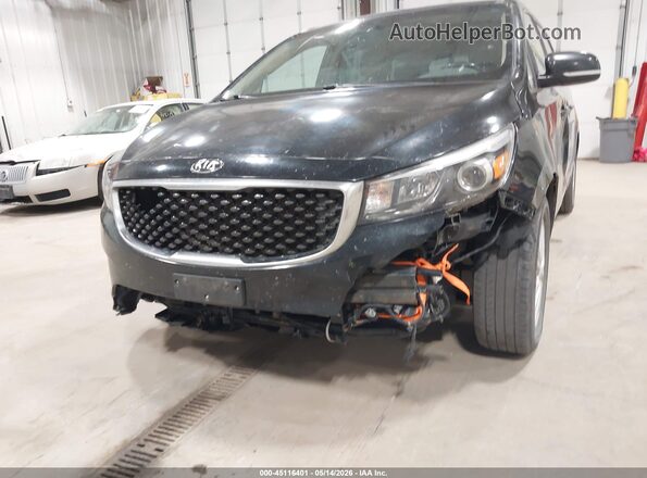 KNDMB5C13H6337896 2017 KIA SEDONA Black Widok z przodu
