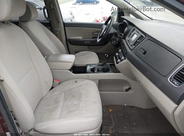 KNDMB5C15G6085633 2016 KIA SEDONA Burgundy Vista interior delantera