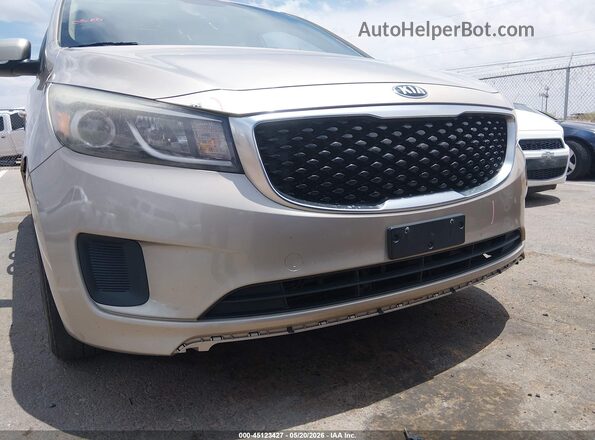 KNDMB5C16G6111026 2016 KIA SEDONA Gold Widok wnętrza z tyłu
