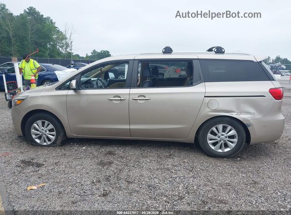 KNDMB5C16G6211434 2016 KIA SEDONA Tan Rear interior view