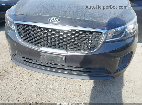 KNDMB5C16H6270338 2017 KIA SEDONA Brown Դիմացի տեսք