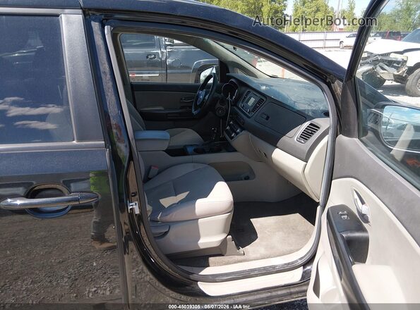 KNDMB5C18H6217978 2017 KIA SEDONA Черный Вид салона спереди