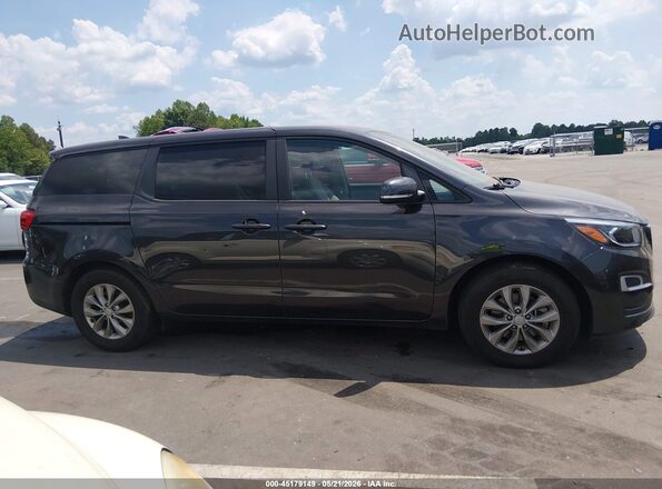 KNDMB5C18K6549104 2019 KIA SEDONA Gray Widok wnętrza z tyłu