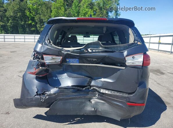 KNDMB5C19H6306362 2017 KIA SEDONA Gray Widok z tyłu