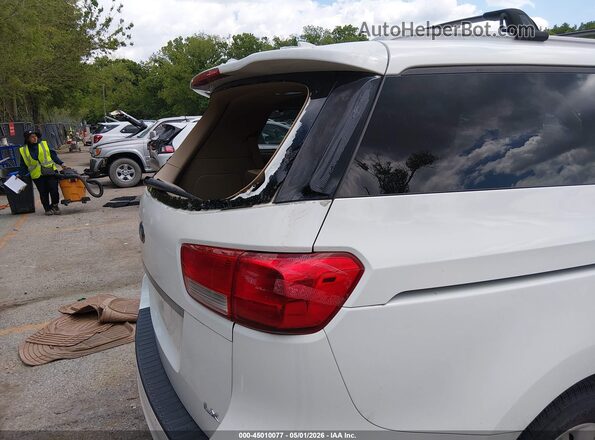 KNDMB5C1XG6090830 2016 KIA SEDONA White Widok wnętrza z tyłu