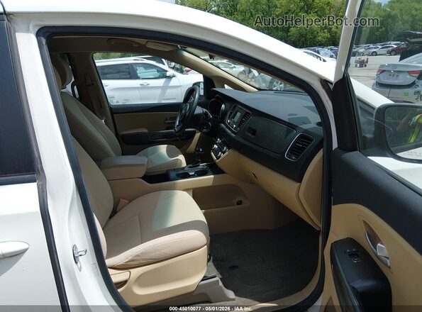KNDMB5C1XG6090830 2016 KIA SEDONA White Widok wnętrza z przodu