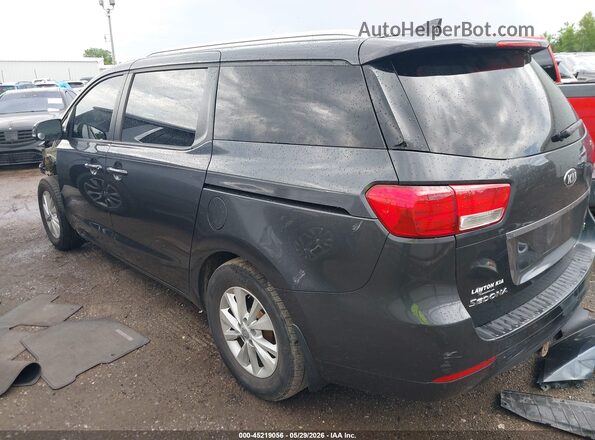 KNDMB5C1XG6099737 2016 KIA SEDONA Black Rear left
