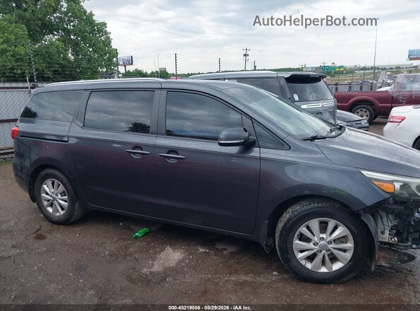 KNDMB5C1XG6099737 2016 KIA SEDONA Black 360 interior view