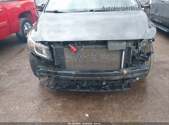 KNDMB5C1XG6099737 2016 KIA SEDONA Black Rear interior view