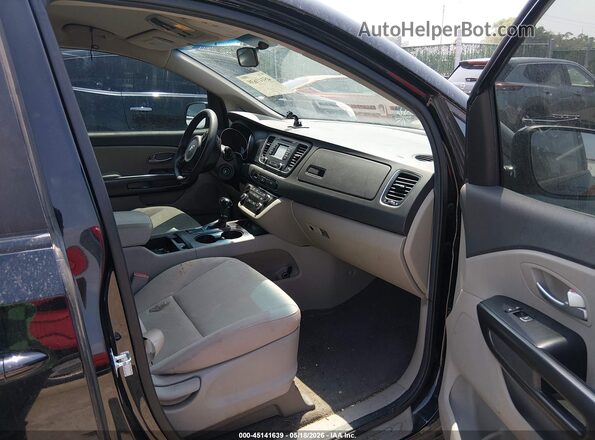 KNDMB5C1XG6160424 2016 KIA SEDONA Black Front interior view
