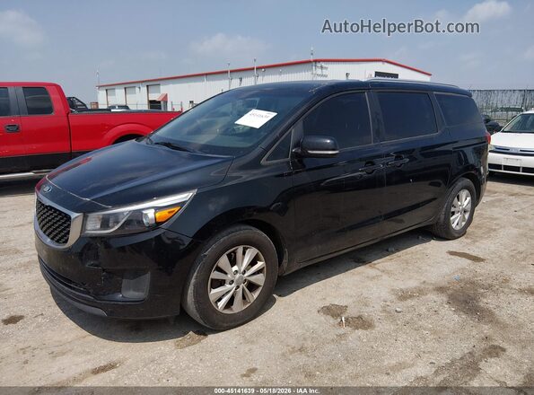 KNDMB5C1XG6160424 2016 KIA SEDONA Black Front left