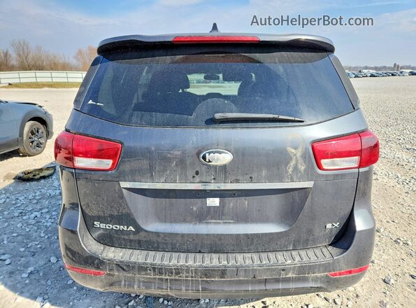 KNDMC5C15G6155404 2016 KIA SEDONA Gray Vista trasera