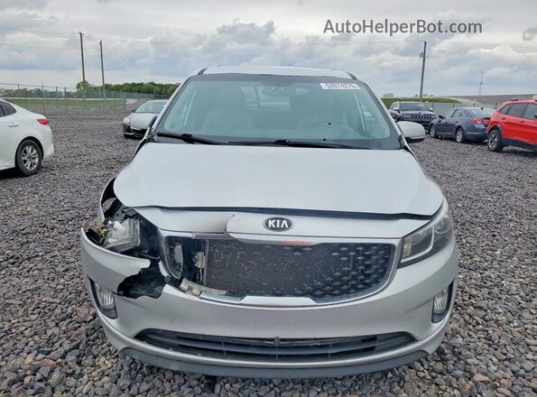 KNDMC5C1XG6136962 2016 KIA SEDONA Silver Front view