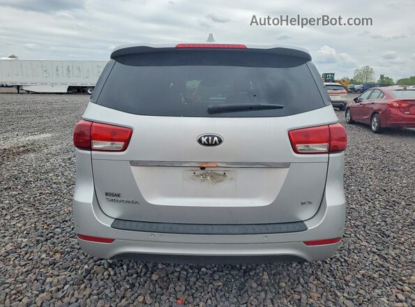 KNDMC5C1XG6136962 2016 KIA SEDONA Silver Rear view