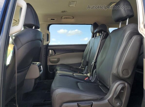 KNDNB5K35T6577368 2026 KIA CARNIVAL Blue Widok wnętrza z tyłu