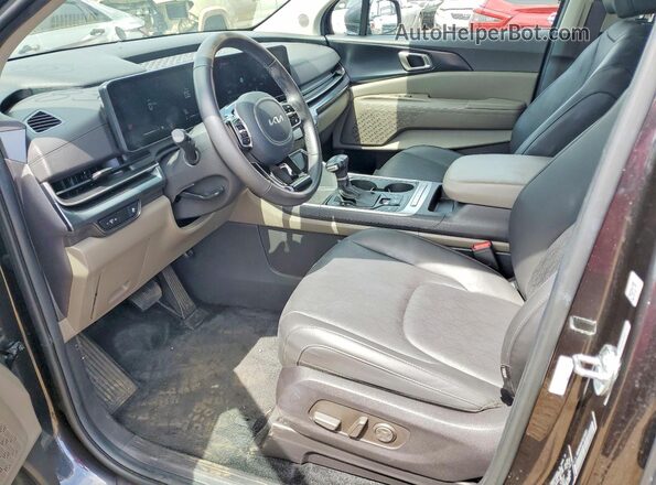 KNDNB5K3XT6570853 2026 KIA CARNIVAL Charcoal Widok wnętrza z przodu