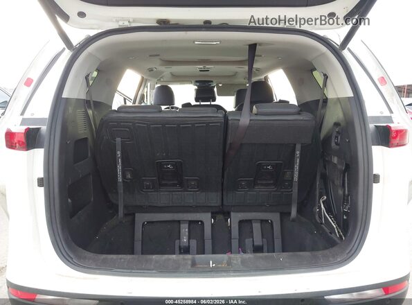 KNDNE5H36P6210239 2023 KIA CARNIVAL MPV White Vista interior trasera