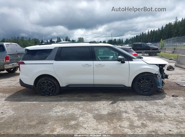 KNDNE5KA1S6054854 2025 KIA CARNIVAL MPV HYBRID White Widok wnętrza z tyłu
