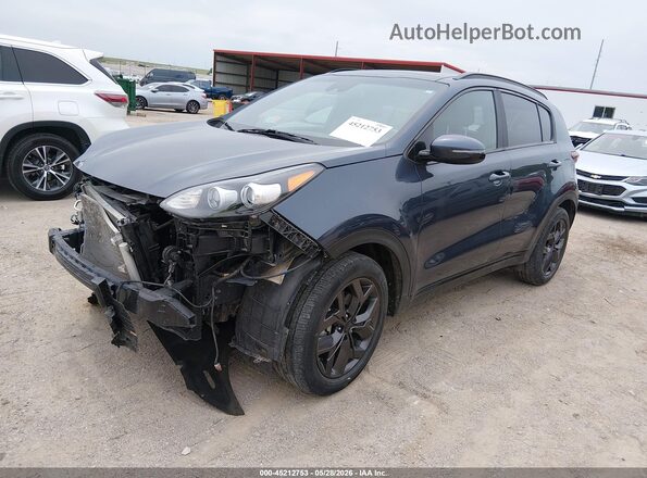 KNDP6CAC4N7955874 2022 KIA SPORTAGE Navy Vista tres cuartos delantera izquierda