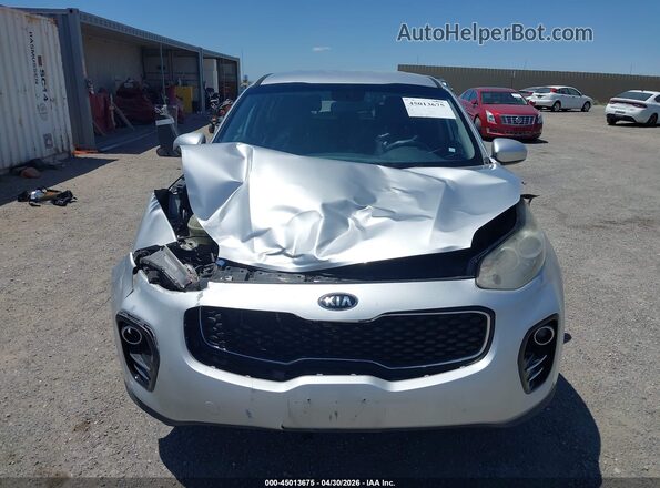 KNDPMCAC7J7381545 2018 KIA SPORTAGE Silver უკანა სალონის ხედი