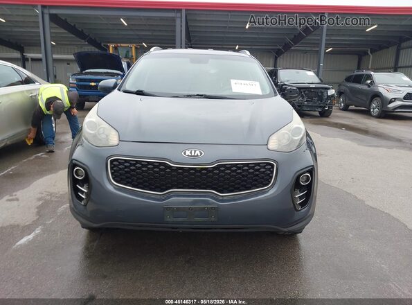 KNDPMCACXH7240009 2017 KIA SPORTAGE Blue Rear interior view