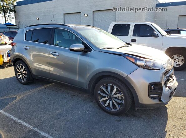 KNDPN3AC3K7613105 2019 KIA SPORTAGE Серебряный Передняя правая четверть