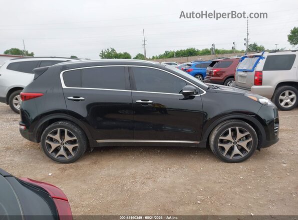 KNDPR3A64H7085551 2017 KIA SPORTAGE Black Widok wnętrza z tyłu