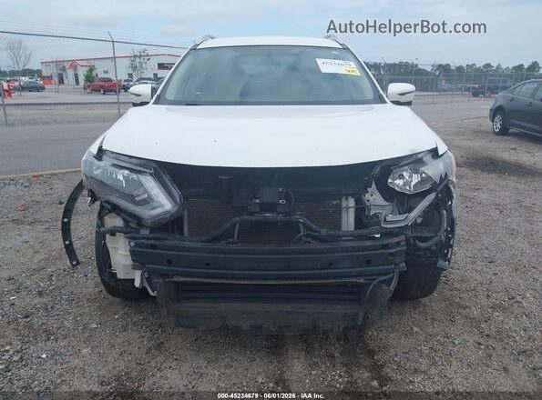 KNMAT2MT6JP606424 2018 NISSAN ROGUE White Rear interior view