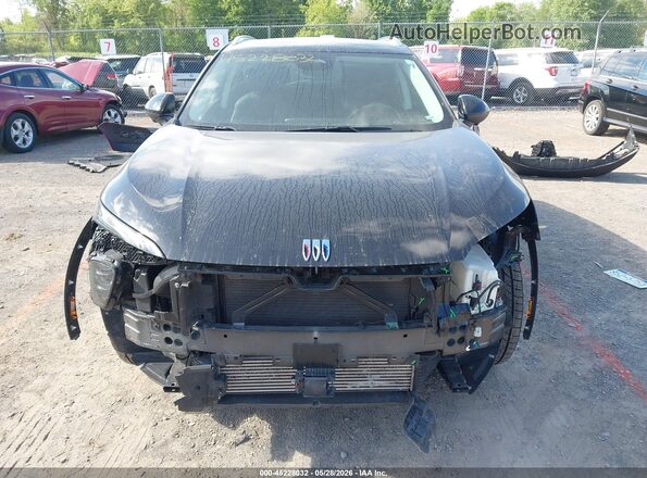 LRBFZME44RD064016 2024 BUICK ENVISION Черный Вид задней части салона