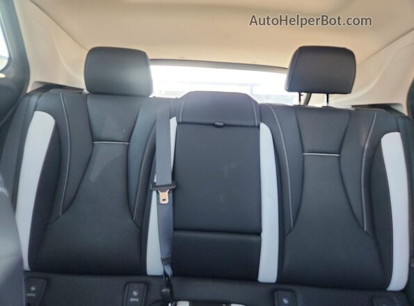 LRBFZPE40RD023979 2024 BUICK ENVISION Black Vista de los asientos traseros