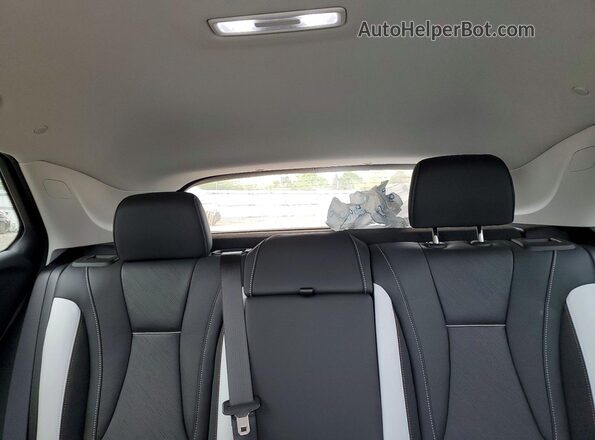 LRBFZPR40TD019433 2026 BUICK ENVISION Black Vista de los asientos traseros