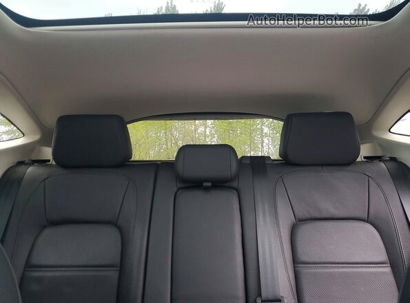 SADFP2FX1J1Z32911 2018 JAGUAR E-PACE Black Vista de los asientos traseros