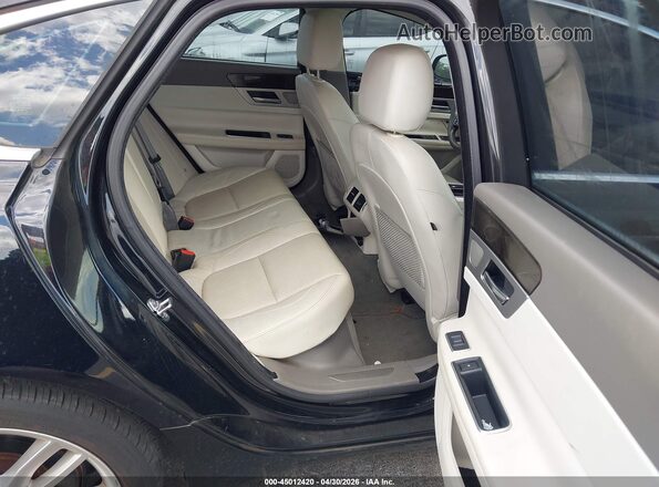 SAJBE4BV6GCY05957 2016 JAGUAR XF Black Вид наклейки з VIN-кодом