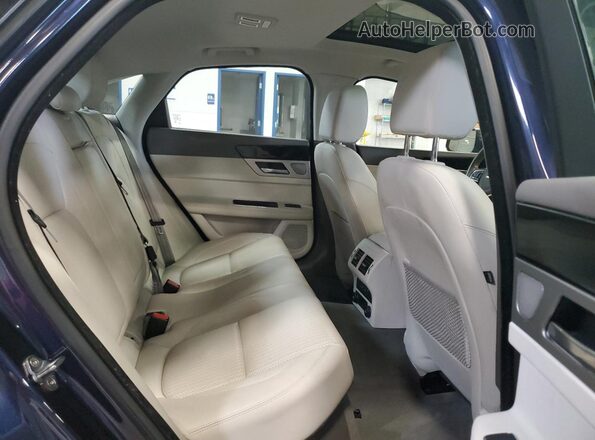 SAJBK4BV1GCY19743 2016 JAGUAR XF Blue Vista de los asientos traseros
