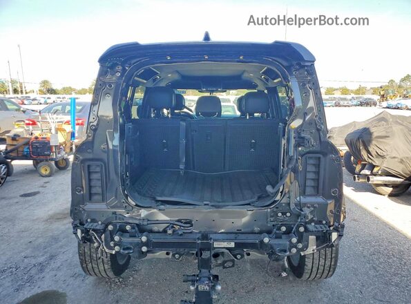 SALEWEEE1S2373697 2025 LAND ROVER DEFENDER Gray Rear view