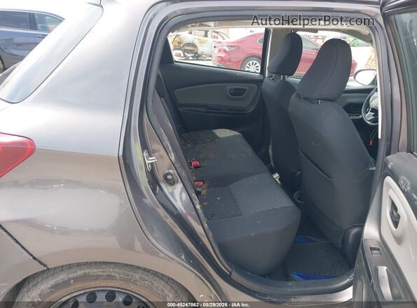 VNKKTUD39HA085932 2017 TOYOTA YARIS Gray VIN კოდის სტიკერის ხედი