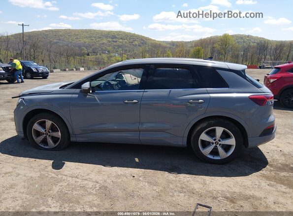 WA1H2BFZ4NP051007 2022 AUDI Q4 Gray Vista interior trasera