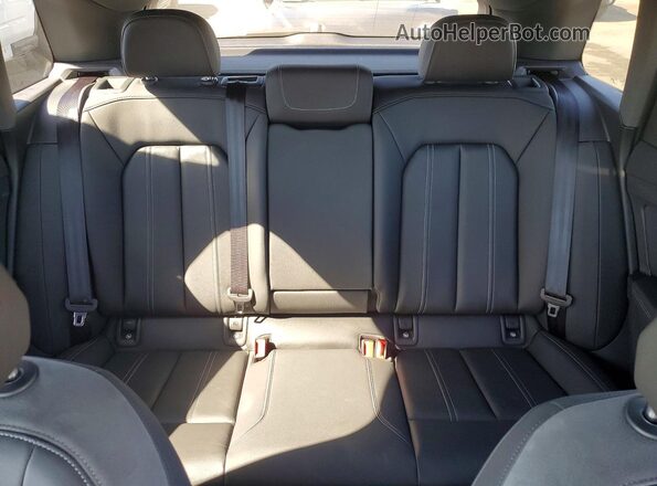 WA1MUBFZ8RP048027 2024 AUDI Q4 Black Vista de los asientos traseros