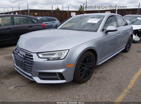 WAUENAF49JA110481 2018 AUDI A4 Silver Vista tres cuartos delantera izquierda