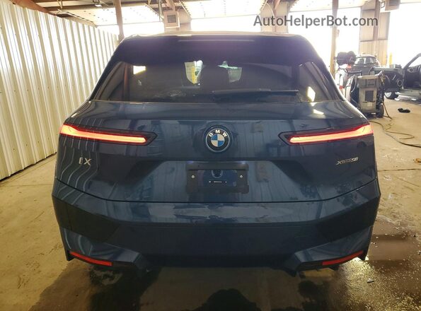 WB523CF00SCU53668 2025 BMW IX Blue Widok z tyłu