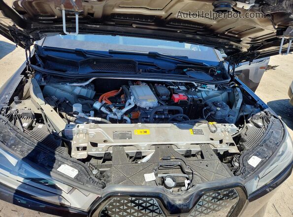 WB523CF03RCR88309 2024 BMW IX Black Widok komory silnika