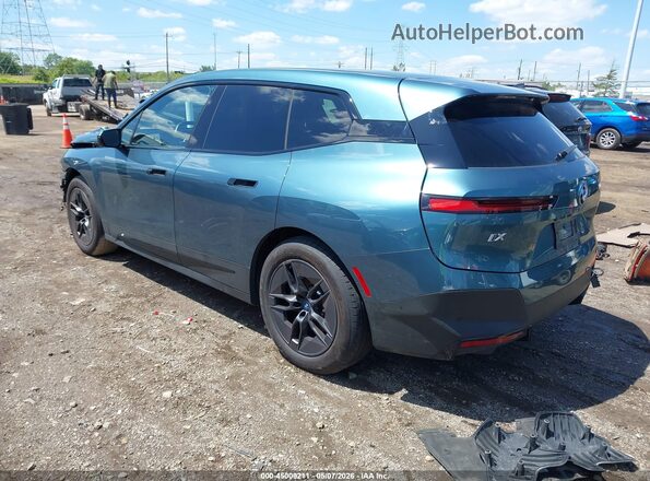 WB523CF03SCU09700 2025 BMW IX Teal Trasero izquierdo